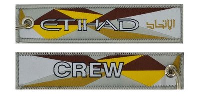 Keyholder with Etihad on one side and (Etihad) crew on other side 